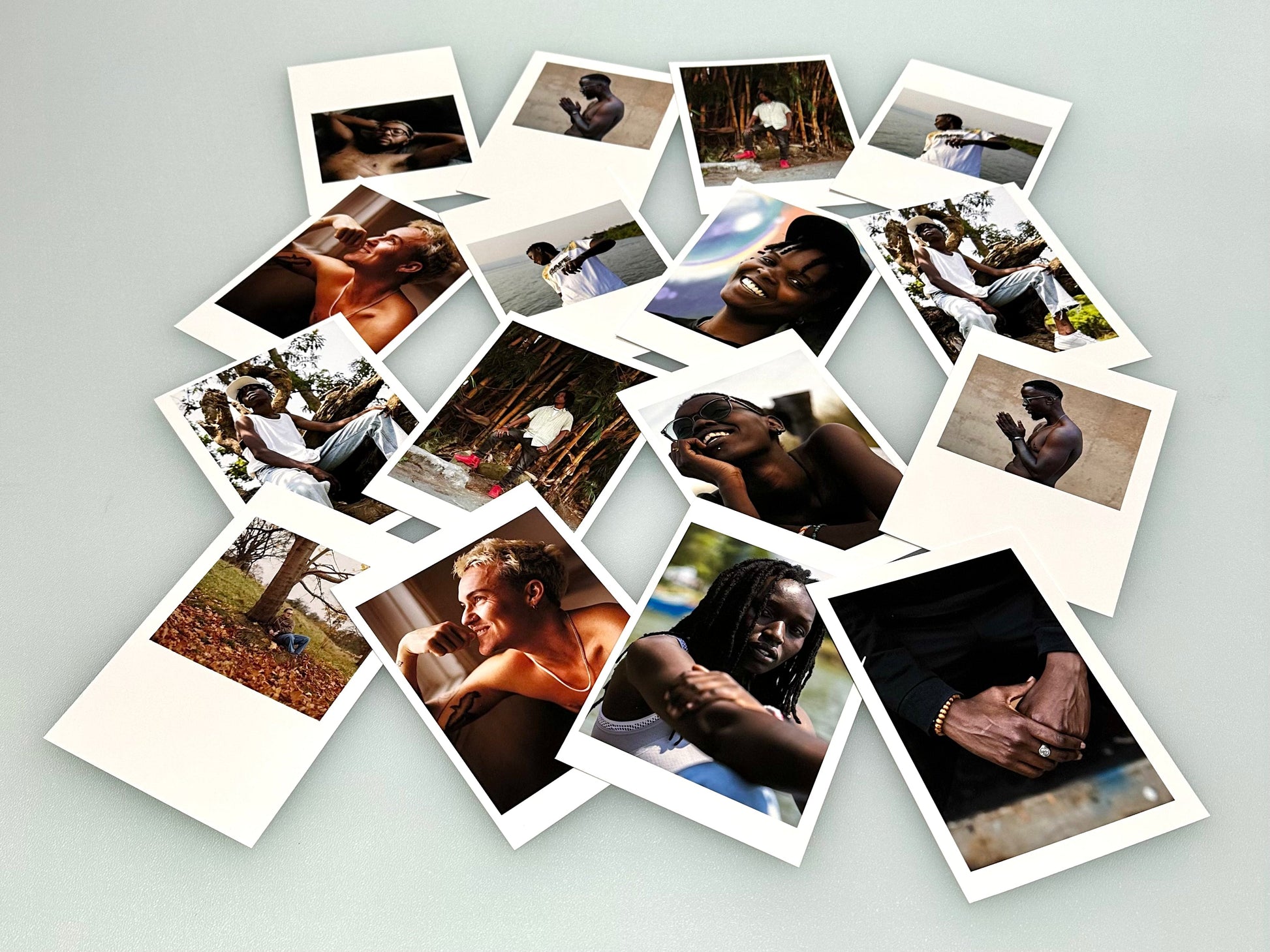 16 vibrant pigment printed A6 House Textured 100% Cotton Rag 320 gsm fine art artist cards on a blue desk